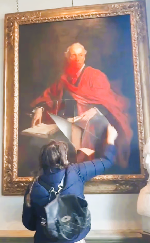 University of Cambridge ,A pro-Palestine protester has slashed and sprayed a painting of Lord Balfour
